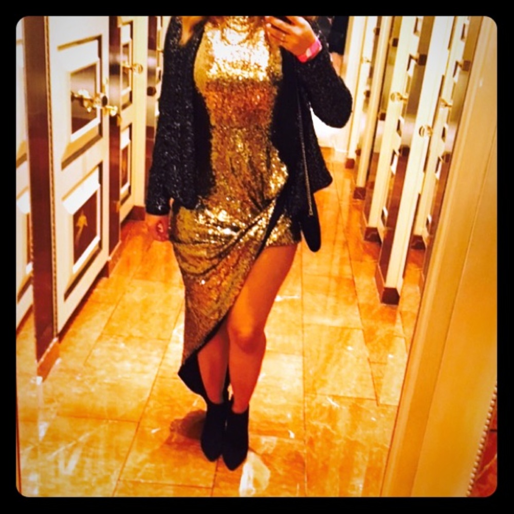 Gold sequin high low dress.